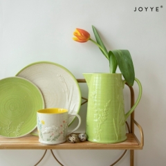 Green and White Embossed Bunnies Tableware Collection