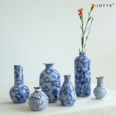 Blue and White Flower-Stamped Ceramic Vase Collection