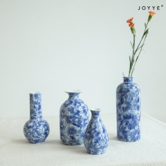Blue and White Flower-Stamped Ceramic Vase Collection