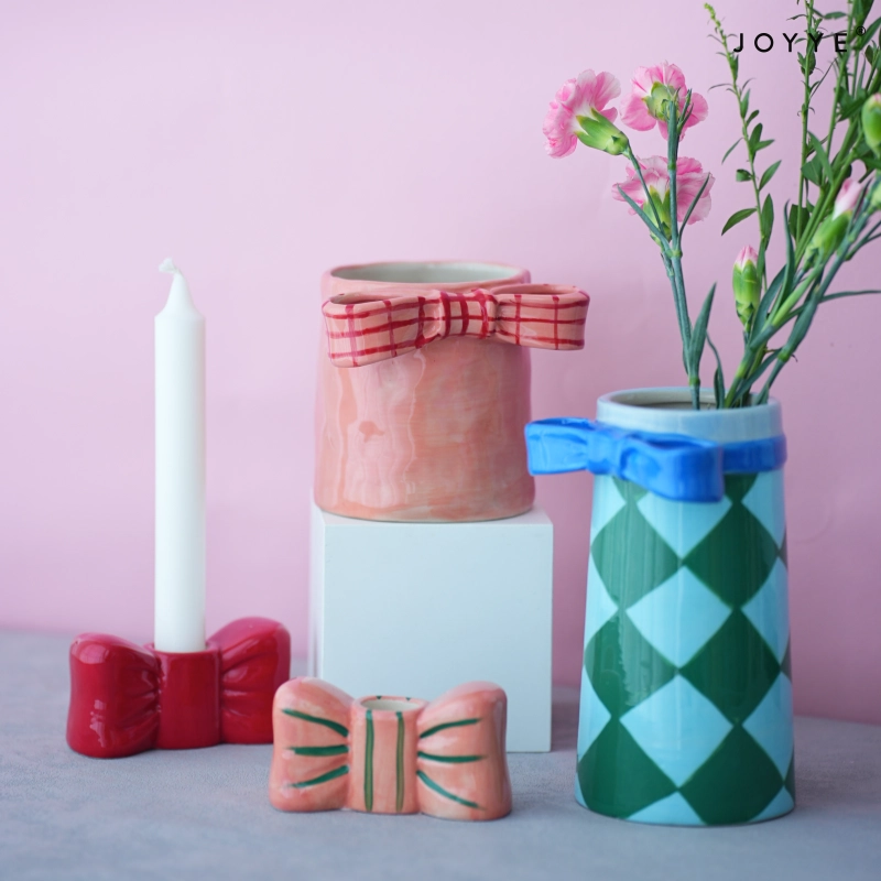 Playful Bow-shaped Candle Holders and Vases